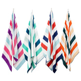 Exclusivo Mezcla 4 Pack beach towel on sand demonstrating quick-dry and sand shake-off