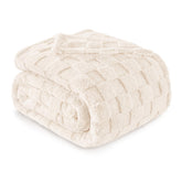 Exclusivo Mezcla king size blanket ivory folded, showcasing soft brushed microfiber texture.