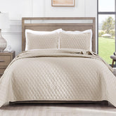 Exclusivo Mezcla reversible king quilt top view in Brich Beige enhances bedroom decor