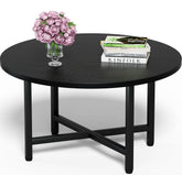 FAMIDGE round coffee table with wood top and metal legs, ideal for living rooms.