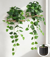FancyPlus fake pothos plants with black gold pots for indoor decor.