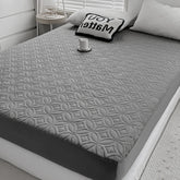 FELTYBED full-size waterproof mattress protector guarding a 54x75 bed against spills