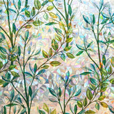 Finnez window film reveals a rainbow leaf effect, adding privacy and color to bright spaces.