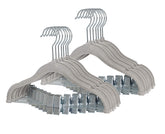 Finnhomy velvet hanger with movable clips keeps baby outfits organized.
