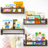 Fixwal nursery shelves in brown provide sturdy wall storage for books and keepsakes.