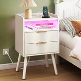 Fixwal white fluted nightstand with charging station keeps devices powered and within reach.