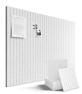 Fluxynara tiles assembled on the wall form a customizable bulletin board for notes and schedules.