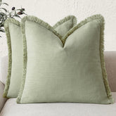 Foindtower linen fringe pillow cover in light sage adds Boho charm and breathable texture.