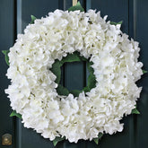 FOTEEWL artificial hydrangea wreath on a front door adding welcoming spring vibes