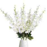 Fqueelvys white delphinium in a tall vase for elegant home decor