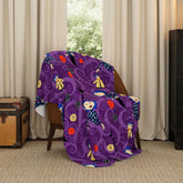 Franco Coraline button eyes throw showcases button motif for cozy movie-night ambiance