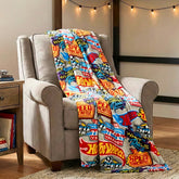 Franco Hot Wheels throw blanket close-up of racing logos for cozy moments