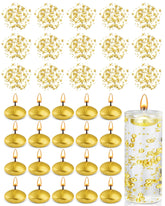 Fumete gold floating candles illuminate centerpieces with a warm glow for weddings