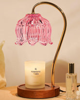 Funistree pink candle warmer lamp with lotus shade provides flameless fragrance.