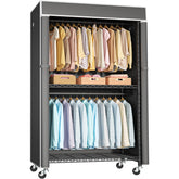 FUTASSI black clothing rack with cover, side view showing dust protection