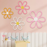 Ganeen Boho nursery woven daisy flowers collection adds cohesive charm to any wall.