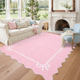 GarveeHome scalloped bow rug for living rooms with soft pink tone and elegant edges.
