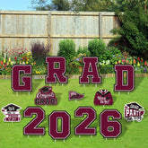 Gatherfun maroon graduation yard sign featuring a cap design for outdoor display