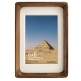 Generic natural wood photo frame in walnut for tabletop display.