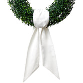 Generic White Wreath Sash on front door adds timeless linen elegance for curb appeal.