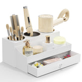 GFWARE acrylic hair dryer holder with drawer neatly organizes tools on the vanity.