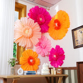 Giegxin giant paper flower rose red creates a striking wall backdrop for events.