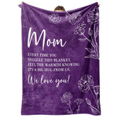 GiltGlimmer mom blanket with heart-text on sofa for cozy moments.