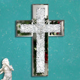 GIMORRTO cross wall decor with a mirrored surface brightens spaces by reflecting light.