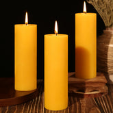 Ginitiri beeswax pillars front view 2x6in bulk pack for warm home ambiance