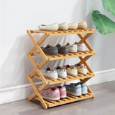 Glsety 4-Tier Bamboo Shoe Rack folded for easy storage and transport.