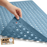 GORILLA GRIP Patented bath tub mat shows strong suction cups for secure placement.
