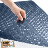 GORILLA GRIP patented bath tub mat with strong suction for secure placement in showers.