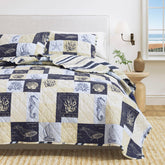 Great Bay Home coastal quilt set with sailboats pattern for a calm nautical bedroom