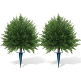 Grooy cedar topiary outdoors with spike for stable porch display.