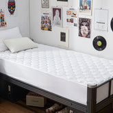 GRT Twin XL waterproof mattress protector with TPU backing protects against spills