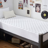 GRT Twin XL waterproof mattress pad with waterproof layer protecting the bed from spills