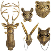 GUASDIE gold deer head wall mount with textured resin finish.