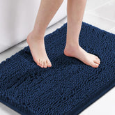 H.VERSAILTEX navy bath mat with non-slip bottom for safe footing.