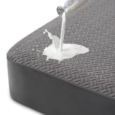 Hanherry waterproof queen mattress protector in grey protecting the mattress from spills