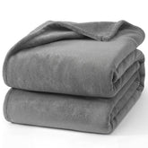 Hansleep fleece grey full blanket on bed for all-season warmth.