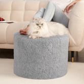 Hansleep round pouf ottoman with foam-filled core in gray, sturdy footrest and seating.