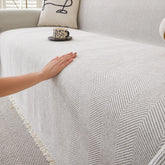 HAOMAIJIA non-slip couch cover on a 3-cushion sofa showing secure fit and protection