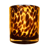 Hapton House tortoise-shell glass candle holder with warm, elegant ambience.