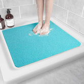 Hargiis non-slip bathtub mat top view in turquoise for safe baths.