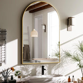 HARRITPURE arched mirror with gold frame enhances bathroom luxury and light.