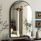 HARRITPURE arched wall mirror with black frame enhances bathroom vanity with clear reflections