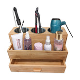Harzen Brothers Hair Tool Organizer in bamboo keeps grooming tools neatly arranged on the counter.