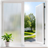 Haton reeded glass window film provides privacy with natural light in bright rooms.