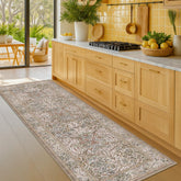 Hazo Haus Moss Green 2'6x8' runner with ornate botanical pattern enhances hallway aesthetics