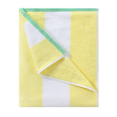 HENBAY cotton oversized beach towel in yellow stripes for poolside lounging.